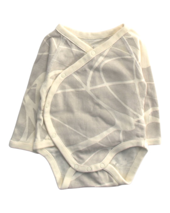 A Beige Long Sleeve Bodysuits from COS in size 3-6M for girl. (Front View)