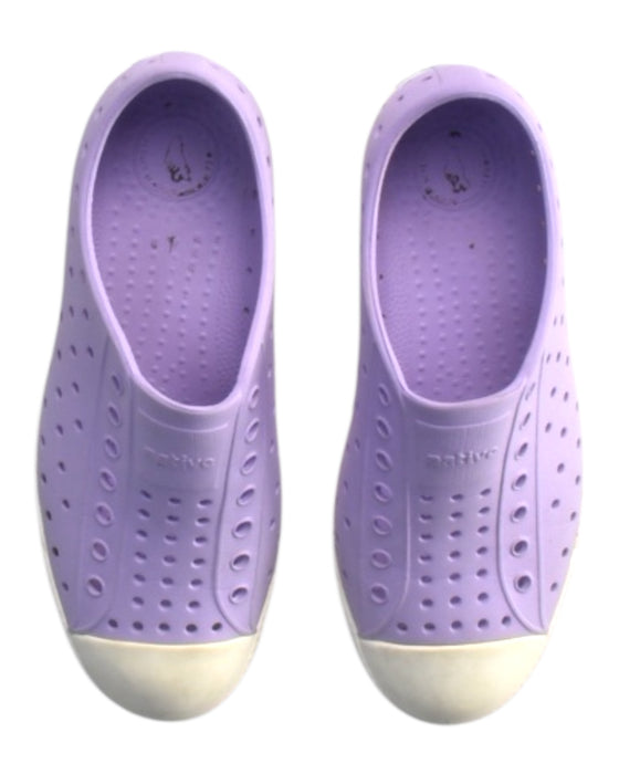 A Purple Slip Ons from Native Shoes in size 7Y for girl. (Back View)