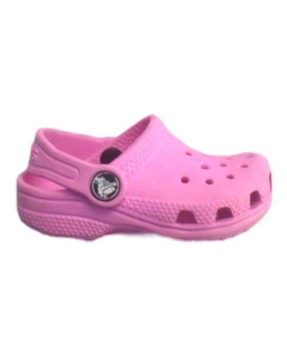 A Pink Slip Ons from Crocs in size 12-18M for girl. (Front View)