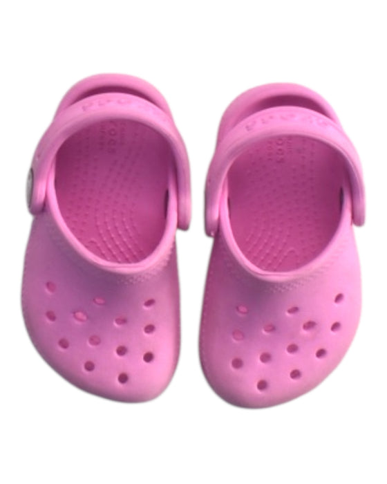 A Pink Slip Ons from Crocs in size 12-18M for girl. (Back View)