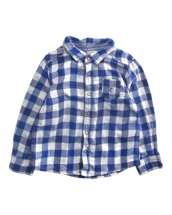 A Blue Long Sleeve Shirts from Petit Bateau in size 4T for boy. (Front View)