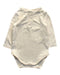 A Ivory Long Sleeve Bodysuits from Seed in size 0-3M for girl. (Front View)
