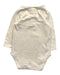 A Ivory Long Sleeve Bodysuits from Seed in size 0-3M for girl. (Back View)