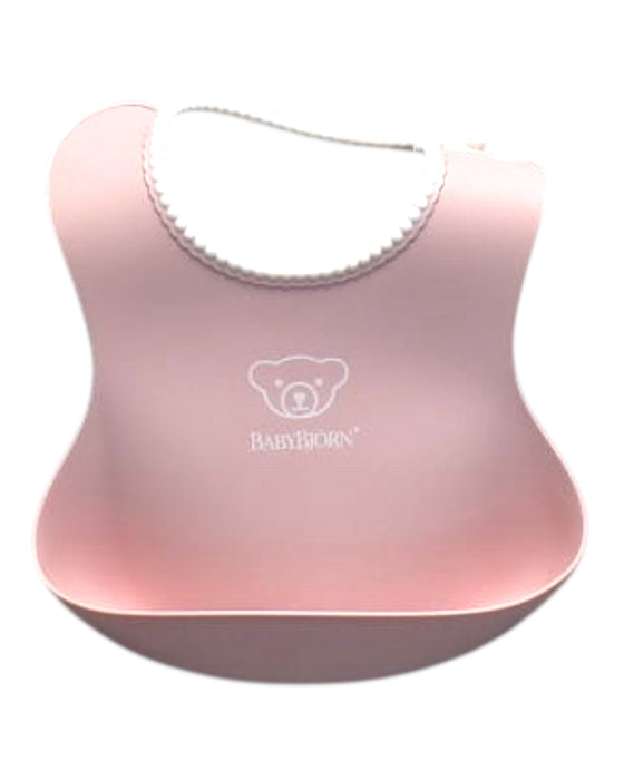 A Pink Bibs from BabyBjorn in size O/S for girl. (Front View)