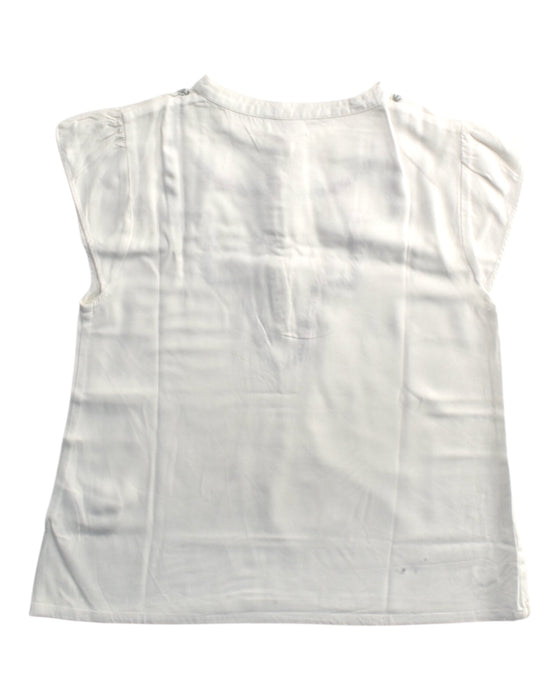 A White Sleeveless Shirts from Chateau de Sable in size 10Y for girl. (Back View)