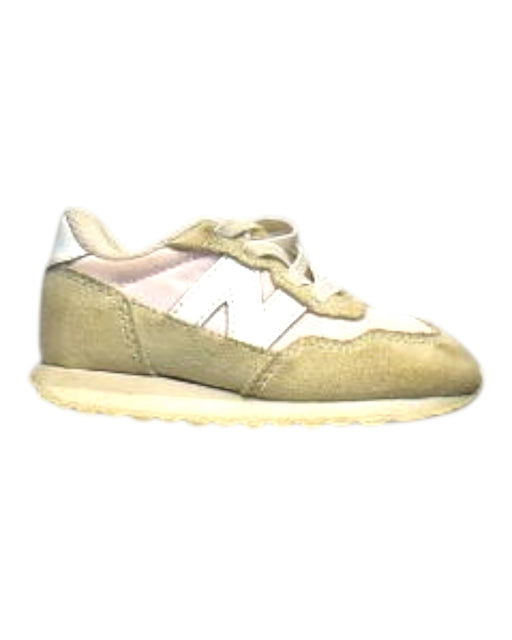 A Beige Sneakers from New Balance in size 18-24M for girl. (Front View)