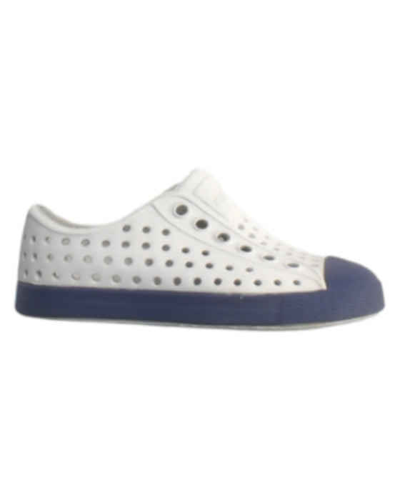 A White Slip Ons from Native Shoes in size 12-18M for boy. (Front View)