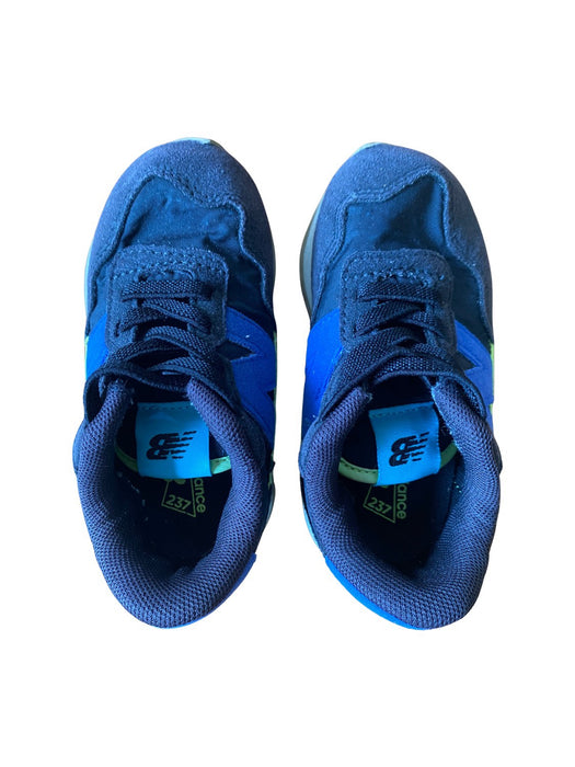 A Blue Sneakers from New Balance in size 18-24M for boy. (Back View)