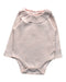 A Peach Long Sleeve Bodysuits from Mothercare in size 6-12M for girl. (Front View)