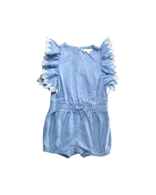 A Blue Sleeveless Rompers from Chloe in size 12-18M for girl. (Front View)