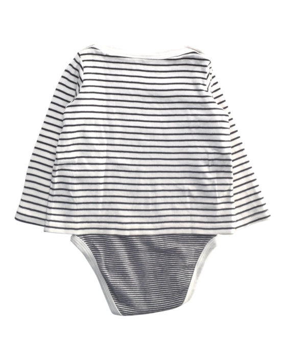 A White Long Sleeve Bodysuits from Petit Bateau in size 12-18M for girl. (Back View)