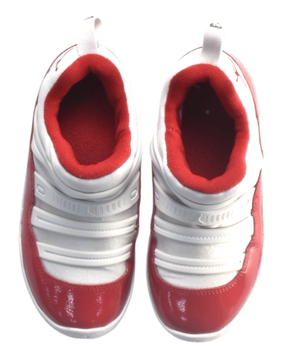 A Red Sneakers from Nike in size 5T for boy. (Back View)