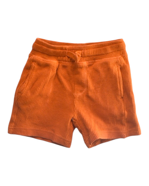 A Orange Shorts from Mothercare in size 3-6M for boy. (Front View)