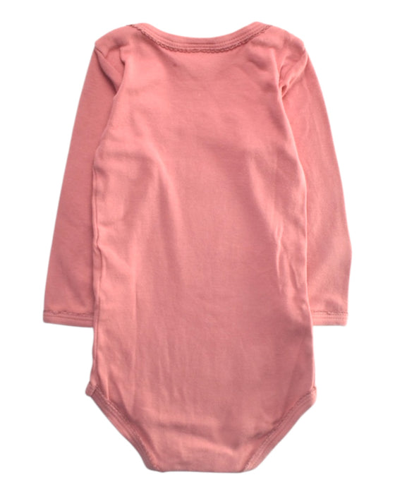 A Pink Long Sleeve Bodysuits from Petit Bateau in size 6-12M for girl. (Back View)