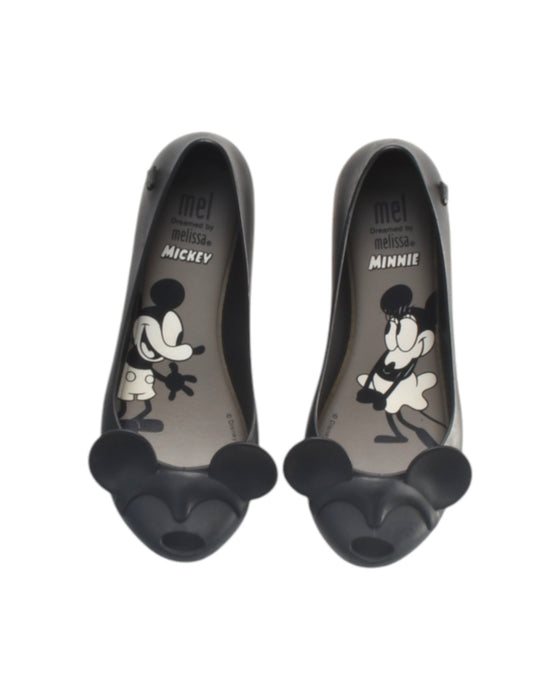 A Black Flats from Mini Melissa Disney in size 6T for girl. (Back View)