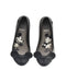 A Black Flats from Mini Melissa Disney in size 6T for girl. (Back View)