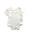 A White Short Sleeve Bodysuits from Mothercare in size 0-3M for girl. (Front View)