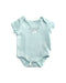 A Blue Short Sleeve Bodysuits from Mothercare in size 0-3M for girl. (Front View)