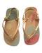 A Gold Flip Flops from Havaianas in size 4T for girl. (Back View)