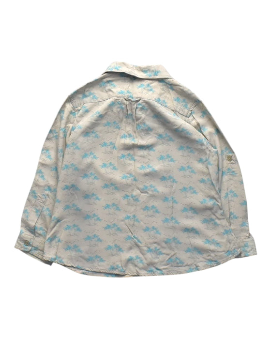 A Blue Long Sleeve Shirts from Chateau de Sable in size 6T for girl. (Back View)