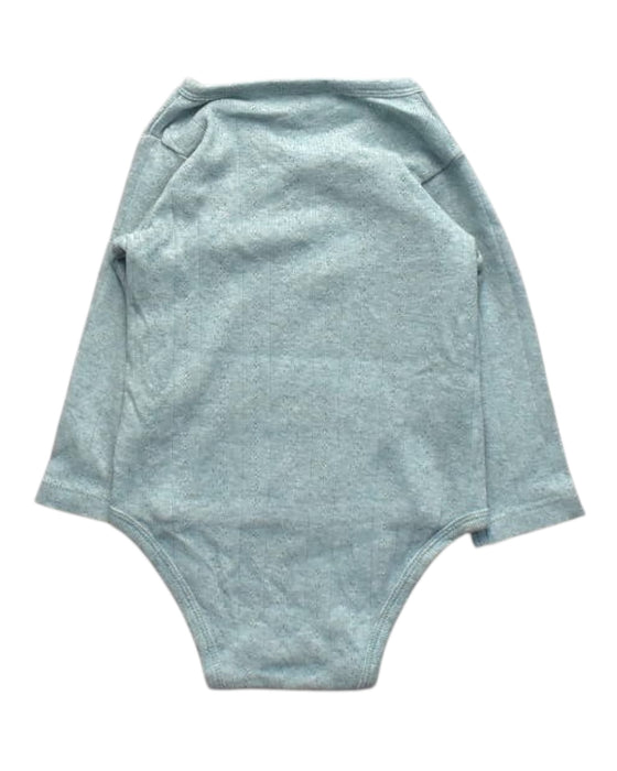 A Grey Long Sleeve Bodysuits from Purebaby in size 6-12M for boy. (Back View)