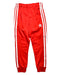 A Red Sweatpants from Adidas in size 5T for boy. (Front View)
