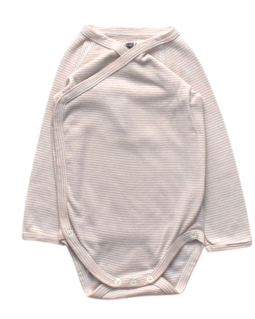 A Beige Long Sleeve Bodysuits from Petit Bateau in size 6-12M for girl. (Front View)