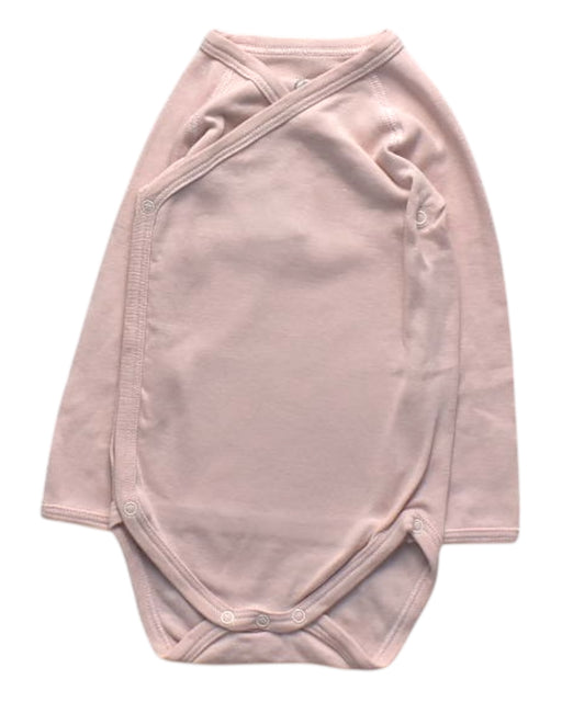 A Pink Long Sleeve Bodysuits from Petit Bateau in size 6-12M for girl. (Front View)