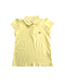 A Yellow Short Sleeve Polos from Lacoste in size 6T for girl. (Front View)