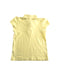 A Yellow Short Sleeve Polos from Lacoste in size 6T for girl. (Back View)