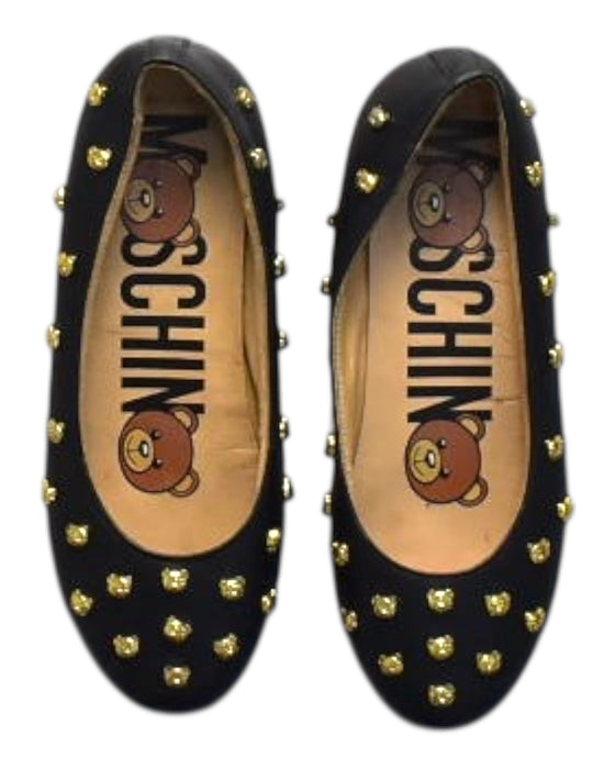 A  Flats from Moschino in size 11Y for girl. (Back View)