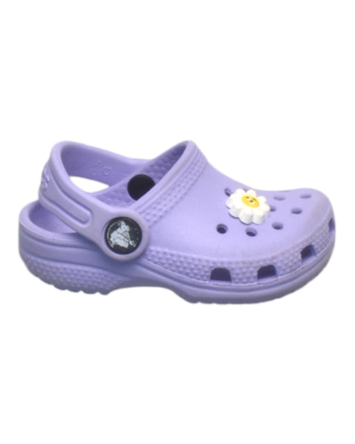 A Purple Slip Ons from Crocs in size 12-18M for girl. (Front View)
