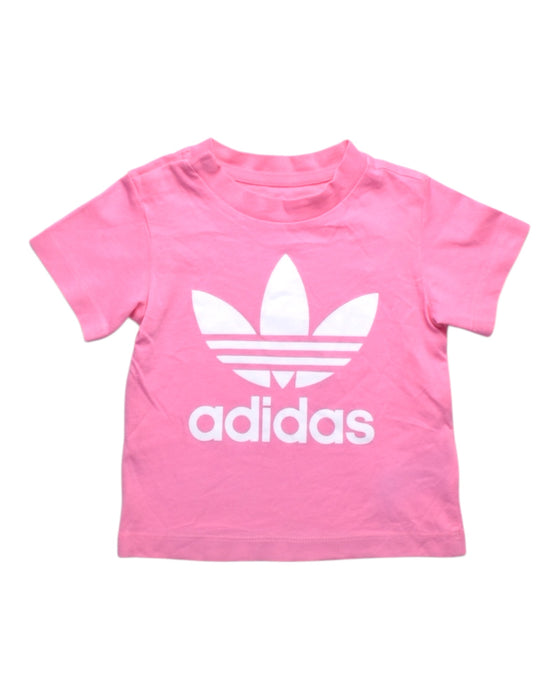 A Pink Short Sleeve T Shirts from Adidas in size 6-12M for girl. (Front View)