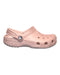 A Pink Slip Ons from Crocs in size 6T for girl. (Front View)
