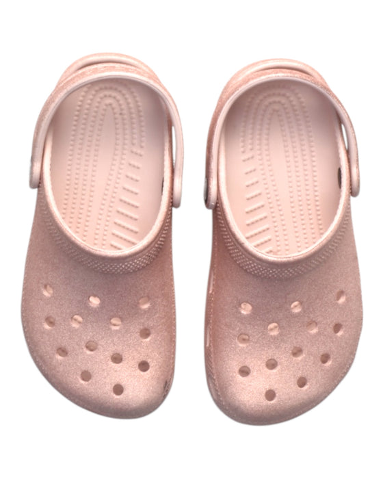 A Pink Slip Ons from Crocs in size 6T for girl. (Back View)