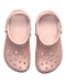 A Pink Slip Ons from Crocs in size 6T for girl. (Back View)