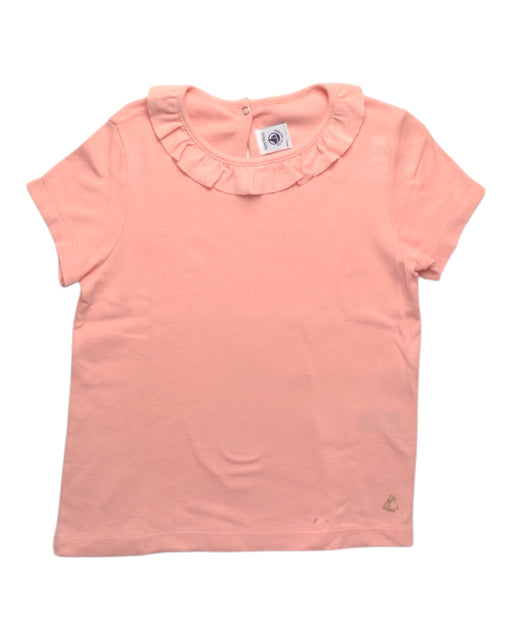 A Pink Short Sleeve Tops from Petit Bateau in size 6T for girl. (Front View)