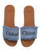 A Blue Slide Sandals from Chloe in size 12Y for girl. (Back View)