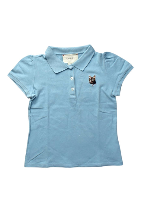 A Blue Short Sleeve Polos from Gucci in size 6T for girl. (Front View)