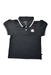 A Black Short Sleeve Polos from Paul Frank in size 8Y for girl. (Front View)