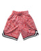 A Red Shorts from Nike in size 6T for girl. (Front View)