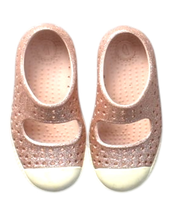A Pink Flats from Native Shoes in size 18-24M for girl. (Front View)