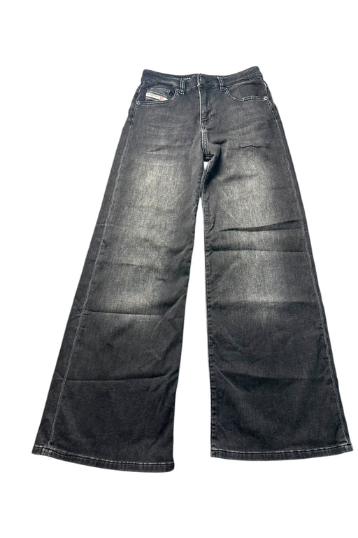 A Black Jeans from Diesel in size 12Y for girl. (Front View)
