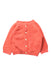 A Peach Cardigans from Petit Bateau in size 6-12M for girl. (Front View)