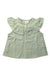 A Green Sleeveless Tops from Lililotte in size 6T for girl. (Front View)