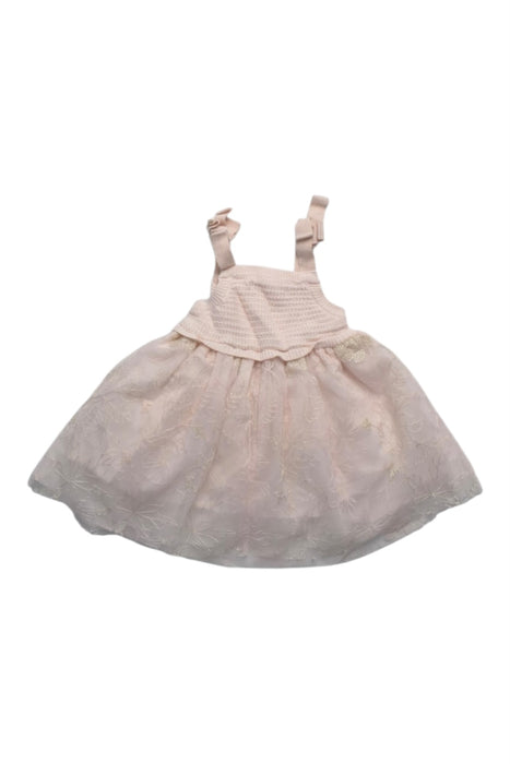 A Ivory Sleeveless Dresses from Gingersnaps in size 6-12M for girl. (Back View)