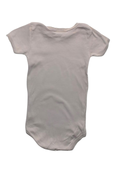A Beige Short Sleeve Bodysuits from Petit Bateau in size 3-6M for girl. (Back View)