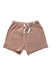 A Peach Shorts from Mori in size 6-12M for girl. (Front View)