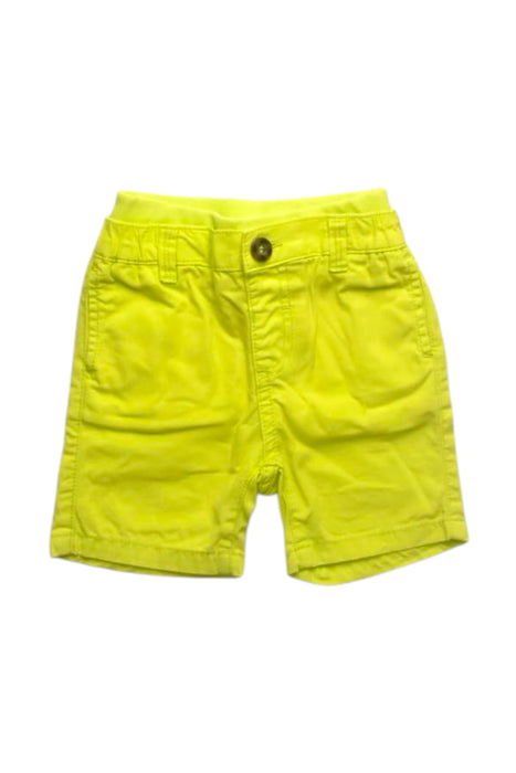 A Yellow Shorts from Mothercare in size 6-12M for boy. (Front View)