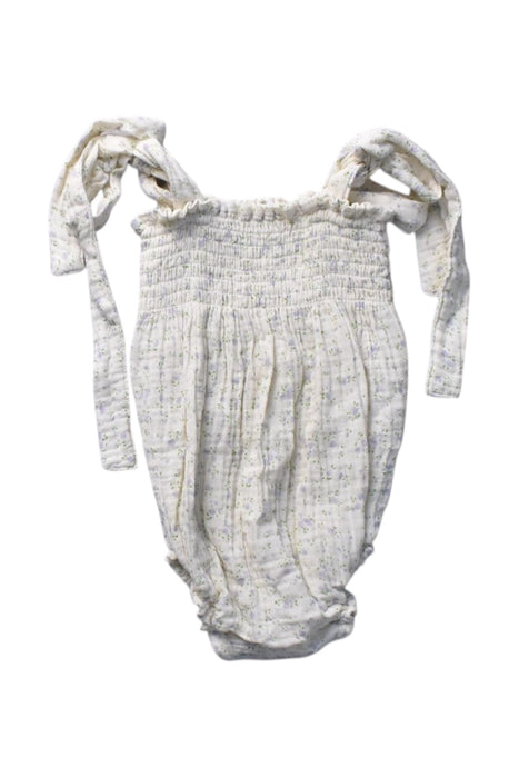A Ivory Sleeveless Rompers from Nothing Fits But in size 3-6M for girl. (Front View)